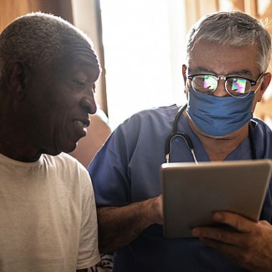 Doctor and patient discussing vaccination.