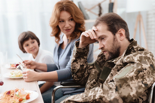 Depressed veteran with family.