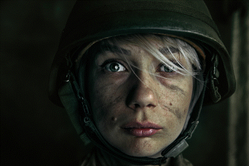 A photo of a scared female soldier.