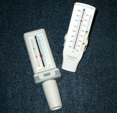 Two Peak Flow Meters Peak flow meters, which measure how well air moves out of lungs.