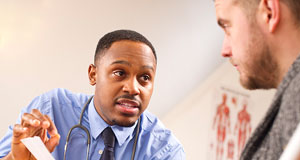 Doctor Discussing HIV Test Result with Patient