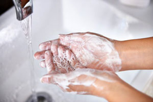 Photo of Person Washing Hands