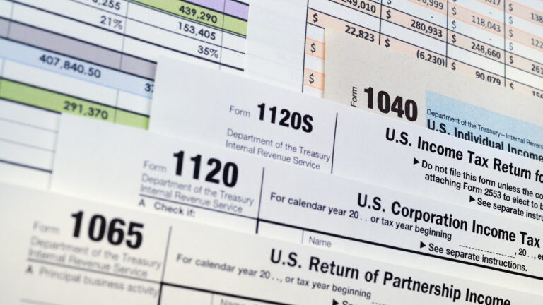 A photo of various income tax forms.