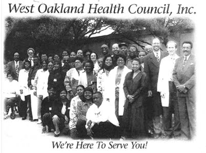 A photograph of the founders and staff of West Oakland Health in its early years.