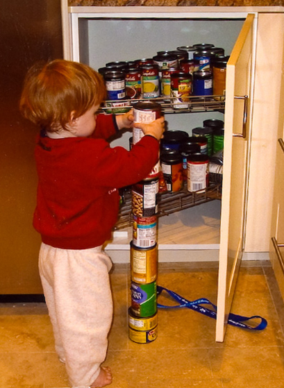 Image: boy with autism obsessively stacking cans Image: boy with autism obsessively stacking cans