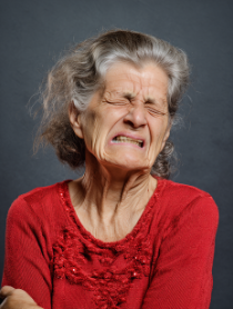 Image: Woman Grimacing in Pain