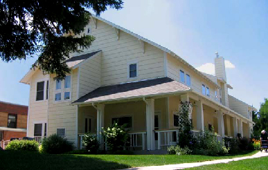 Home-like Specialized Care Unit A memory-care facility with home-like outdoor porch area for seating and reflection.