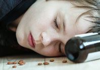 image: A photo of a young woman who has overdosed on pills.