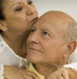 The Importance of Touch A woman comforting her husband.